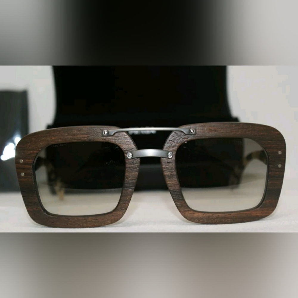 Prada Women's/Unisex Brown Sunglasses. Wood Like Frame.
